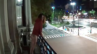 Outdoor public pissing from a balcony in America